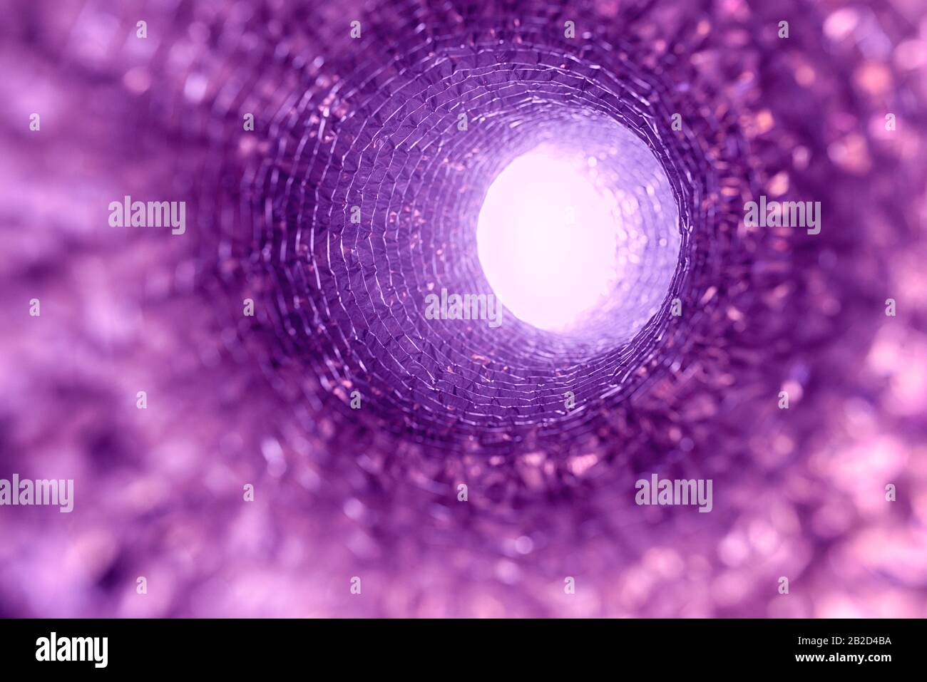 Going after death through pink-purple tunnel, into better world, in direction of bright light. Stock Photo