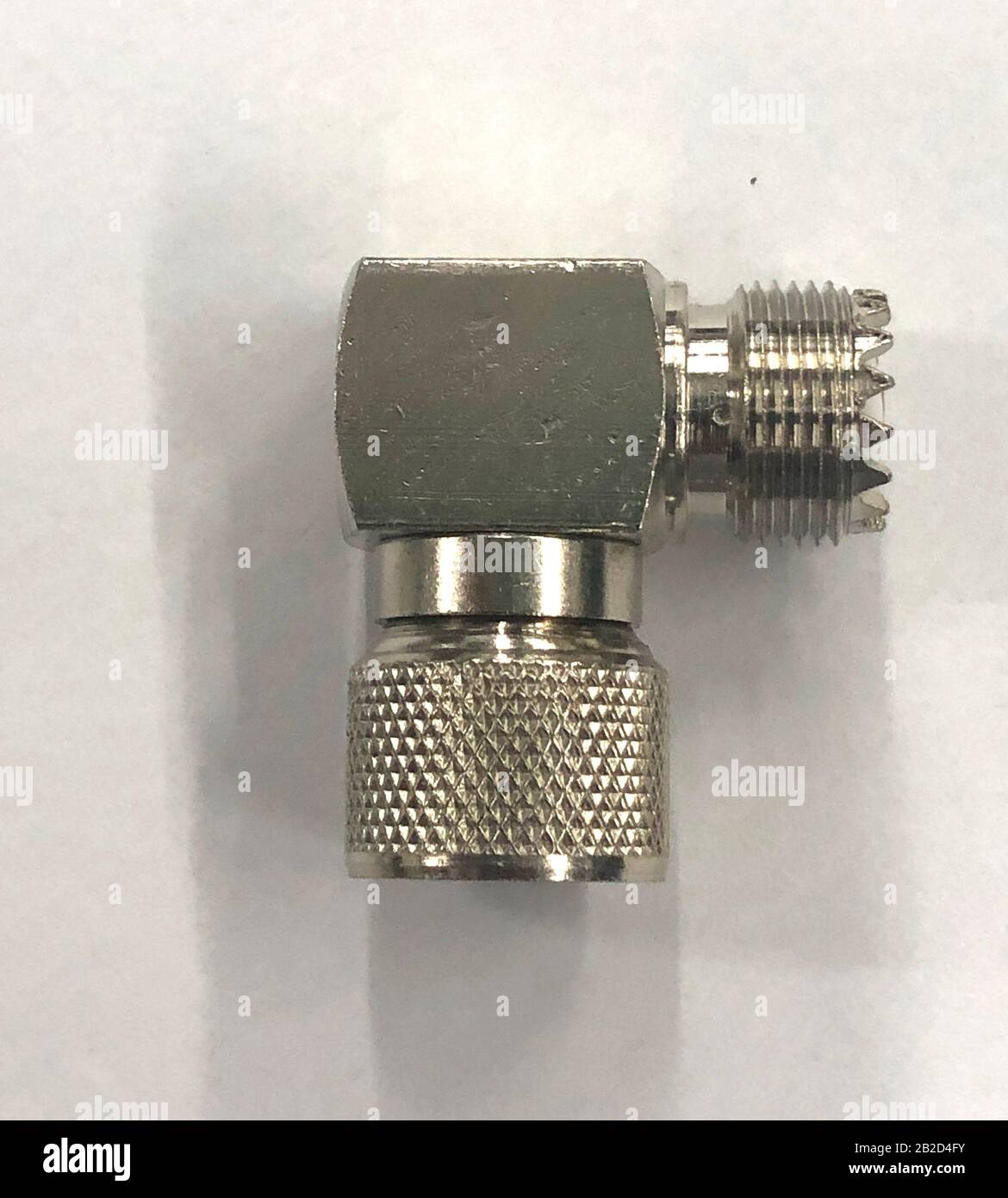 COAXIAL ANTENNA CABLE CONNECTOR, METAL PLUG closeup images, isolated