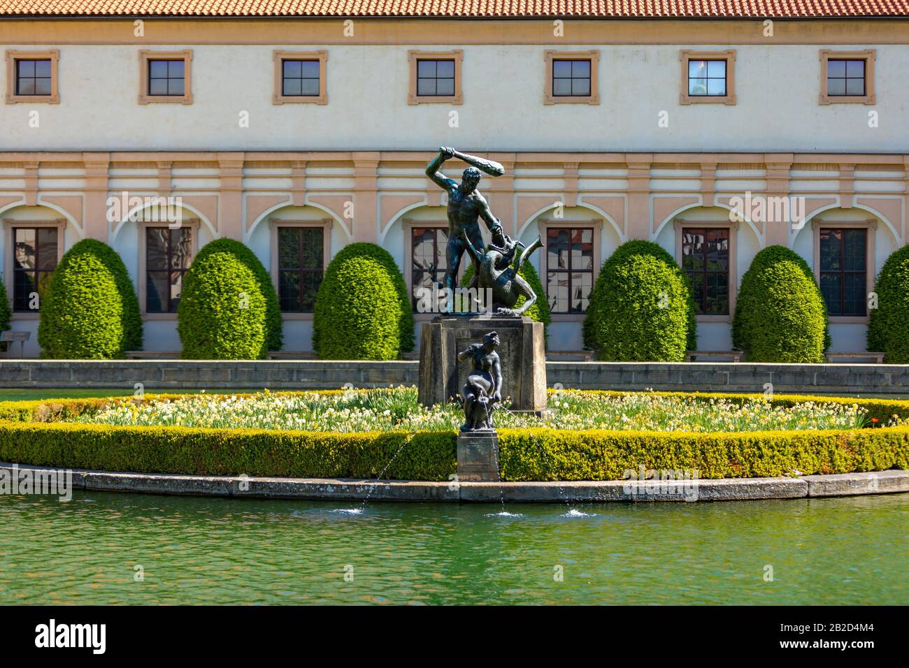 Prague, Czech Republic - 30.04.2019: Hercules statue in the middle of a pond in the Waldstein garden in Prague, Czech Republic Stock Photo