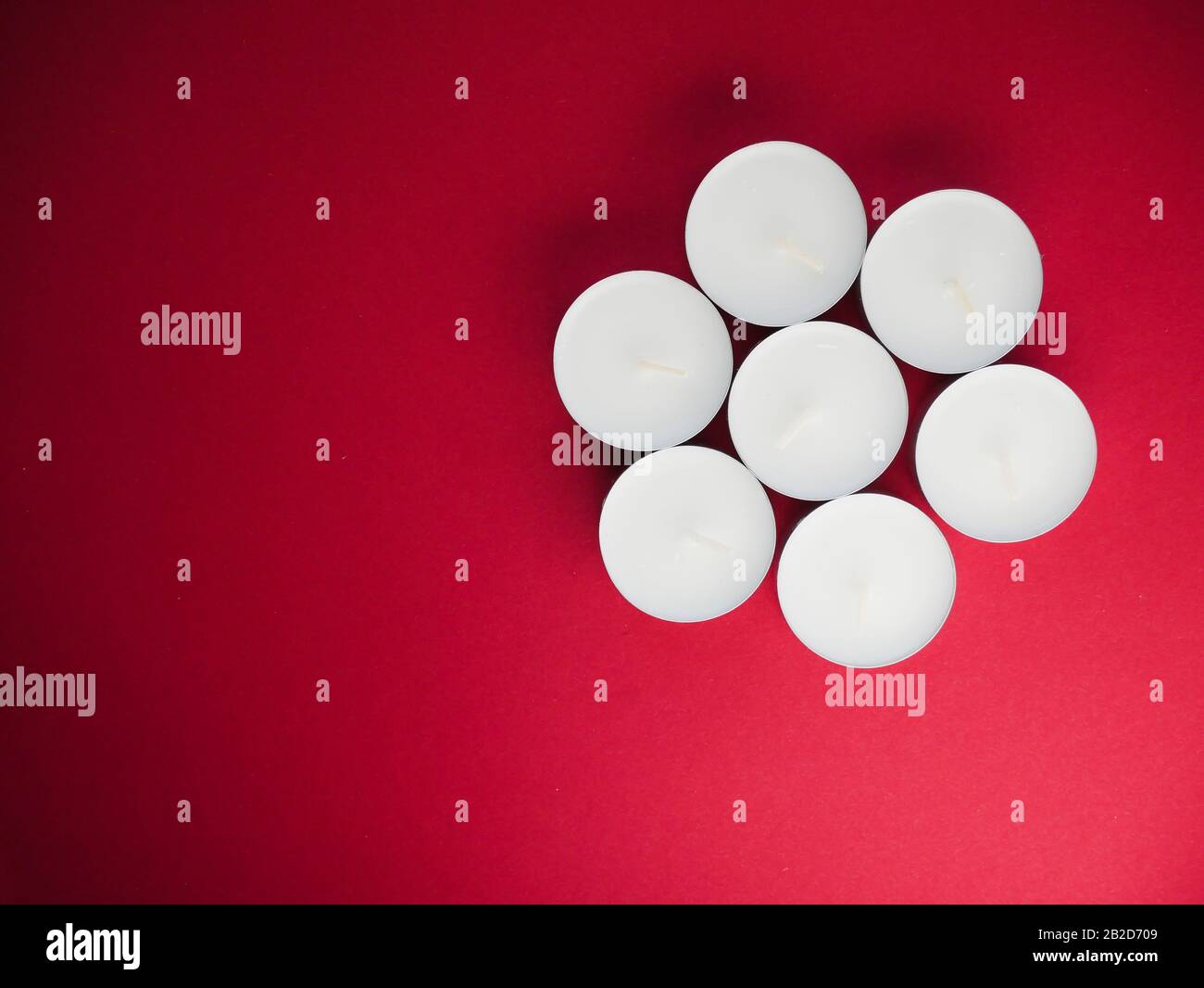 candles. Small candle on red table. Lighter. Professional photo session