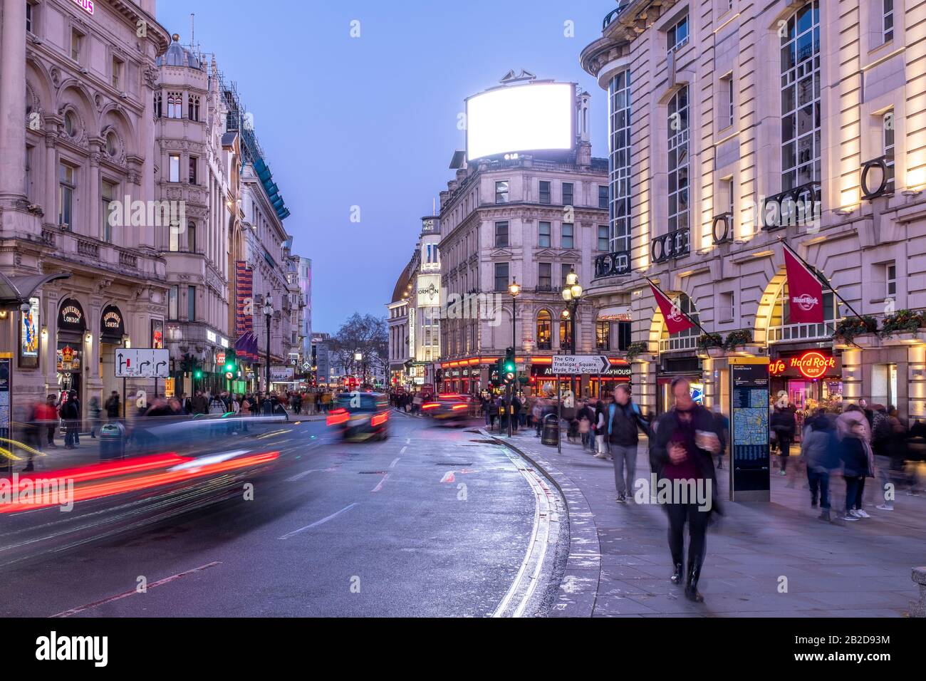 London, Piccadilly Circus- traffic and pedestrians on Coventry street at night Stock Photo