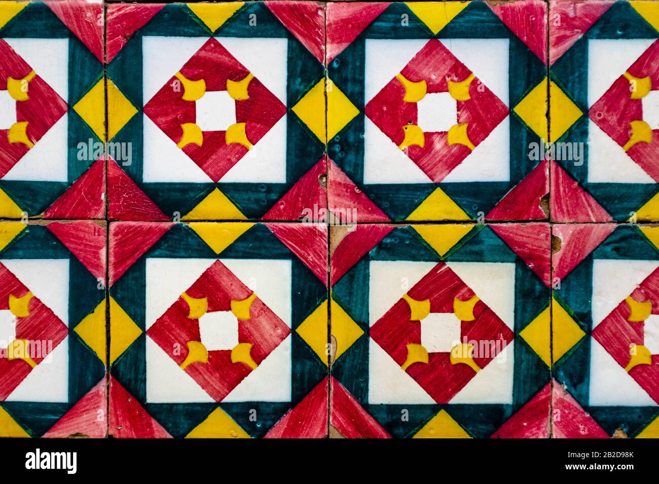 Portuguese traditional tiles Azulejos with colorful geometric pattern. Stock Photo