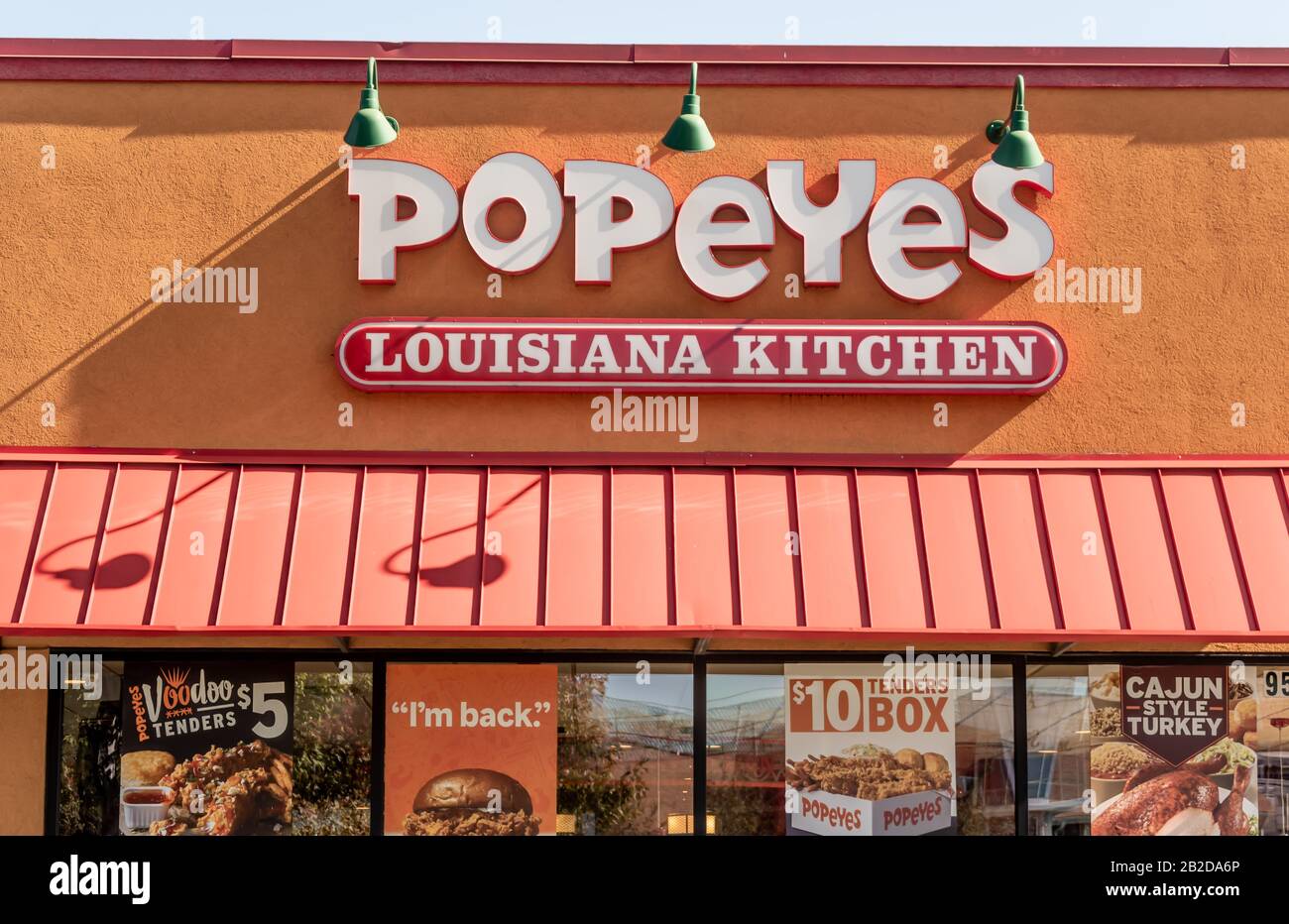 Charlotte Nc Usa Novenber 9 2019 Medium Outdoor Shot Of Red And White Popeyes Louisiana Kitchen Brand On The Facade Of The Building With Awning Stock Photo Alamy
