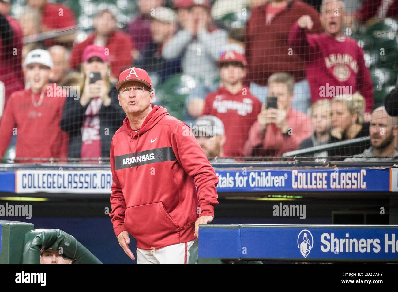 Houston, Texas, USA. 1st Mar, 2020. Arkansas Razorbacks head coach Dave Van Horn argues a call during the 2020 Shriners Hospitals for Children College Classic baseball game between the Baylor Bears and the Arkansas Razorbacks at Minute Maid Park in Houston, Texas. Baylor defeated Arkansas 3-2. Prentice C. James/CSM/Alamy Live News Stock Photo