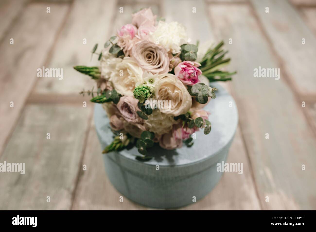 Beautiful bridal bouquet of powder roses. Fashion trend in the wedding ...