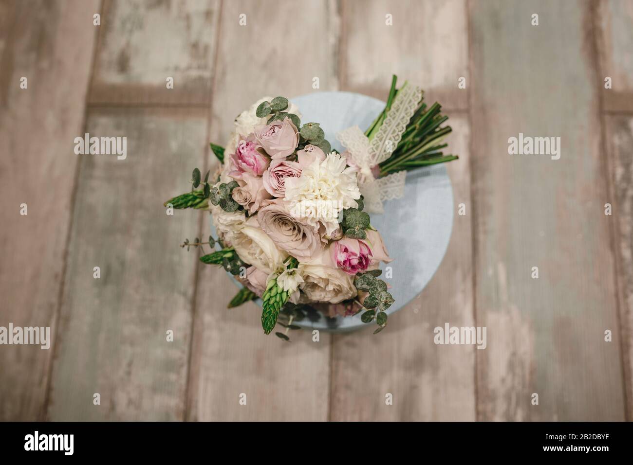 Beautiful bridal bouquet of powder roses. Fashion trend in the wedding ...