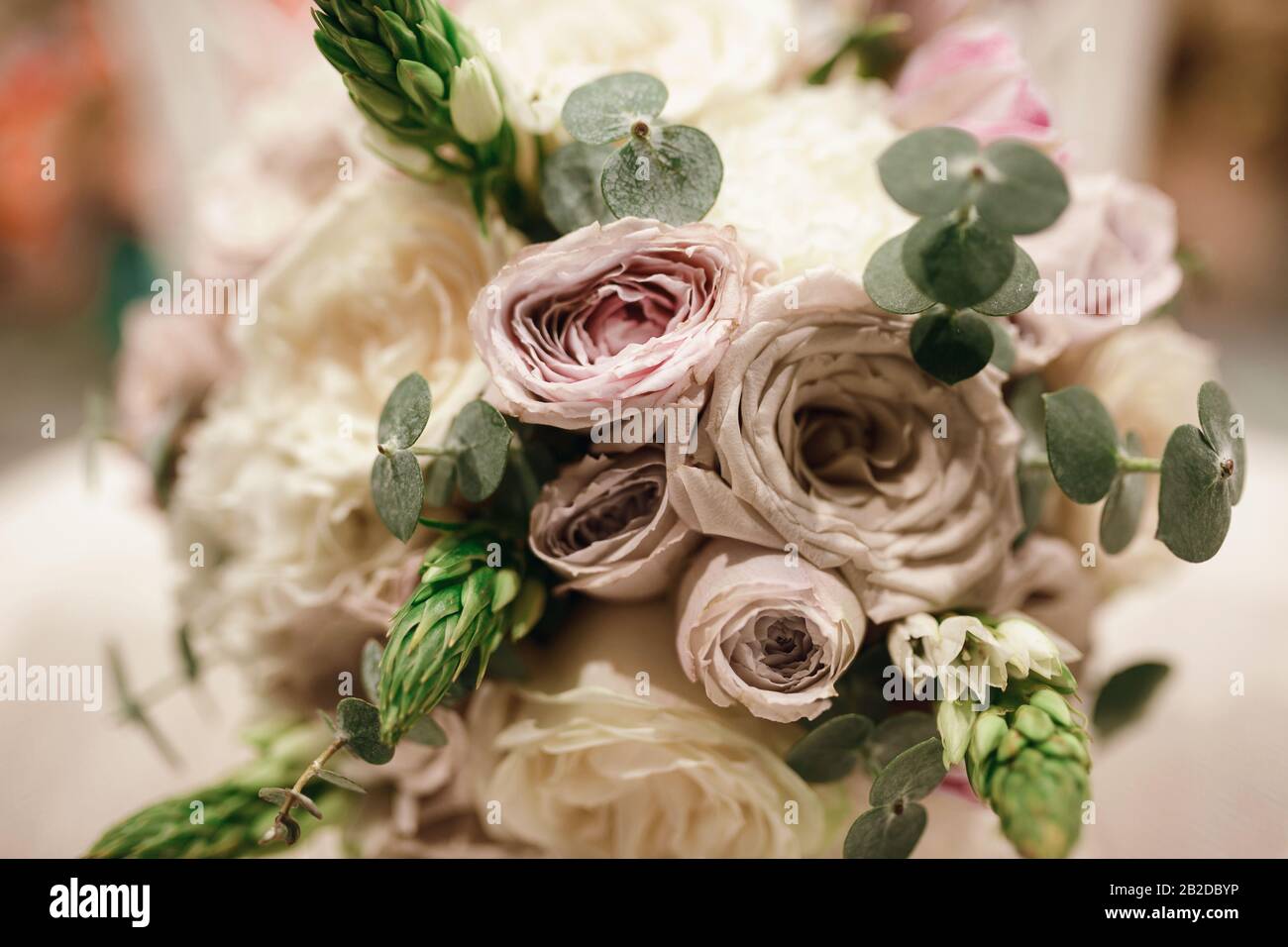 Beautiful bridal bouquet of powder roses. Fashion trend in the wedding ...