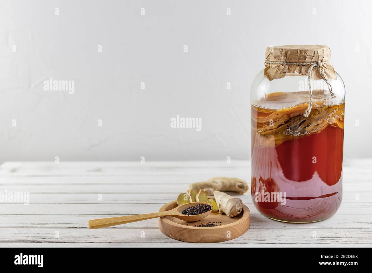 Kombucha superfood pro biotic tea fungus beverage in glass bottle and