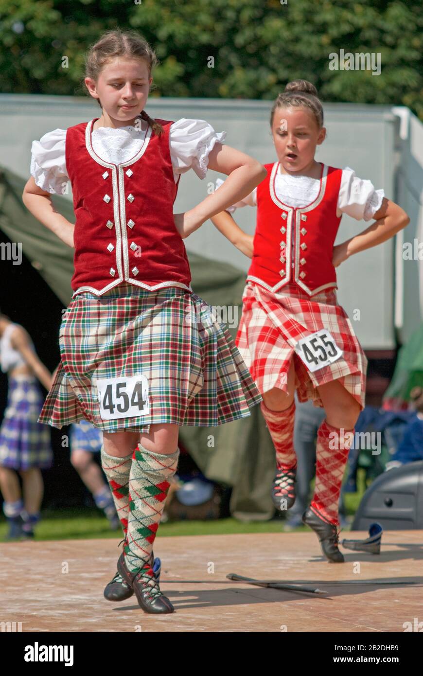 Young Scottish Highland Dancer performing a sword dance during a competition in Colchester, Essex, England. Stock Photo
