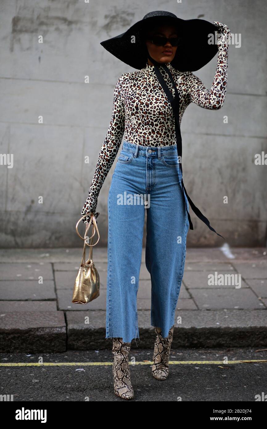 Street Style, London Fashion Week Fall Winter 2020, London  UK Feb Stock Photo