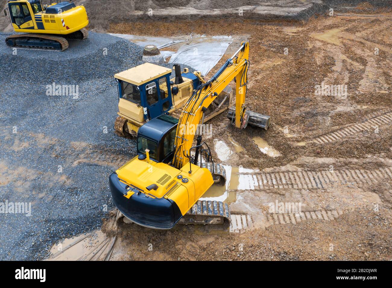 Construction Using Vehicle construction vehicle on an construction site from above Stock Photo - Alamy