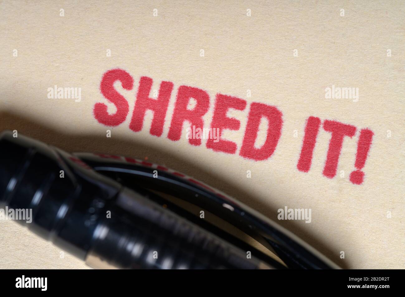 SHRED IT stamped on manilla file folder- privacy concept Stock Photo