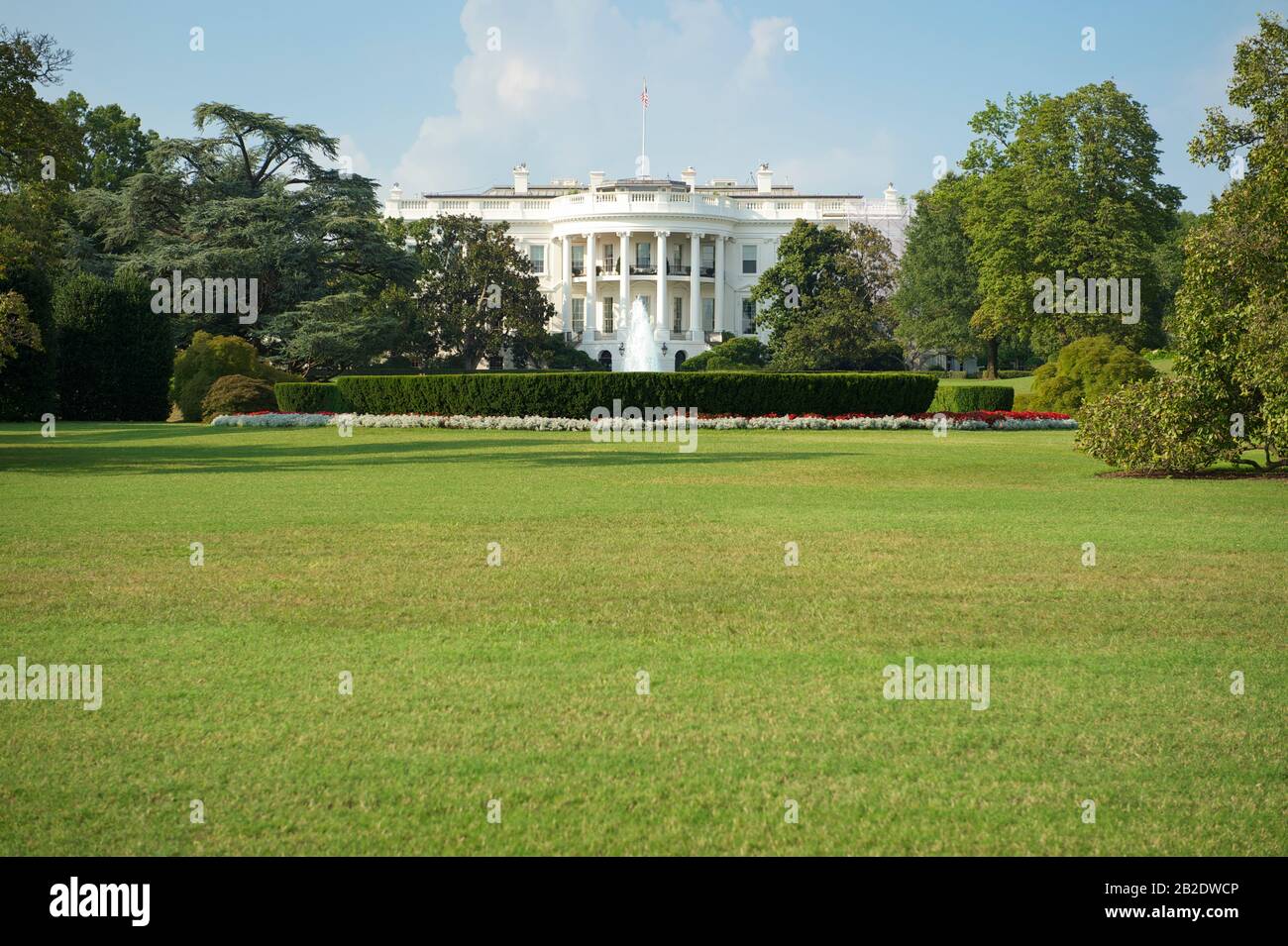 Bright sunny view of the White House with summer greenery on the South Lawn in Washington DC Stock Photo