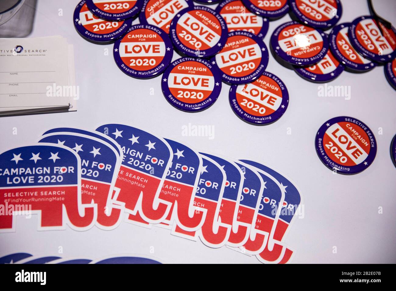 Oxon Hill, Md. 27th Feb, 2020. OXON HILL, Md. - FEBRUARY 27: Sticker and buttons for the company Campaign for Love in their booth at the Conservative Political Action Conference, CPAC 2020, in Oxon Hill, Md., on Thursday, February 27, 2020. Campaign for Love is a bespoke match making service who‚Äôs packages can from anywhere from $50,000 to $500,000.Credit: Samuel Corum/CNP (RESTRICTION: NO New York or New Jersey Newspapers or newspapers within a 75 mile radius of New York City) | usage worldwide Credit: dpa/Alamy Live News Stock Photo
