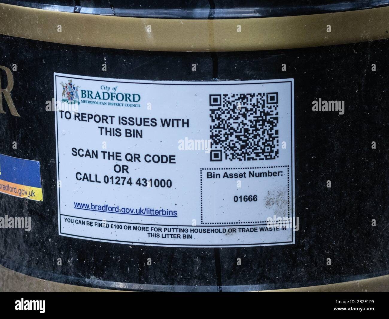 Bradford Council litter bins with a label showing a QR code to scan
