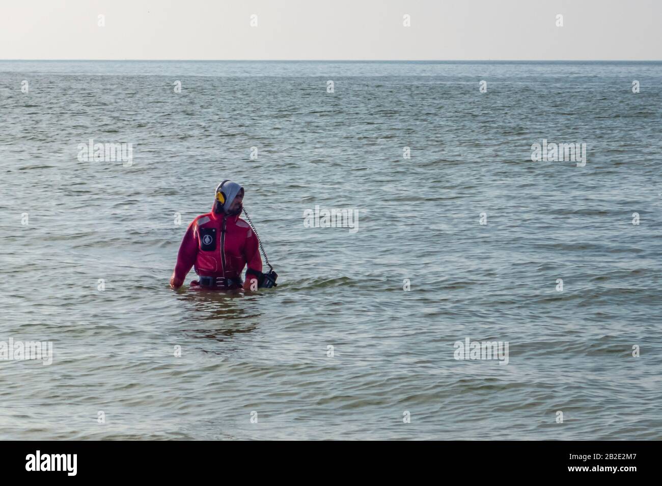 Diver lifeguard in the sea off the coast. Odessa. Ukraine. 2020.02.21 Stock Photo