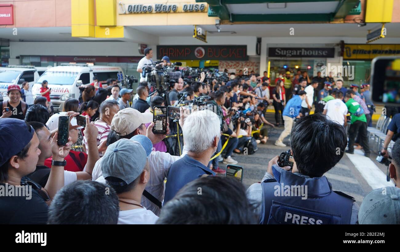 A security guard who was fired from work is holding more than 30 ...