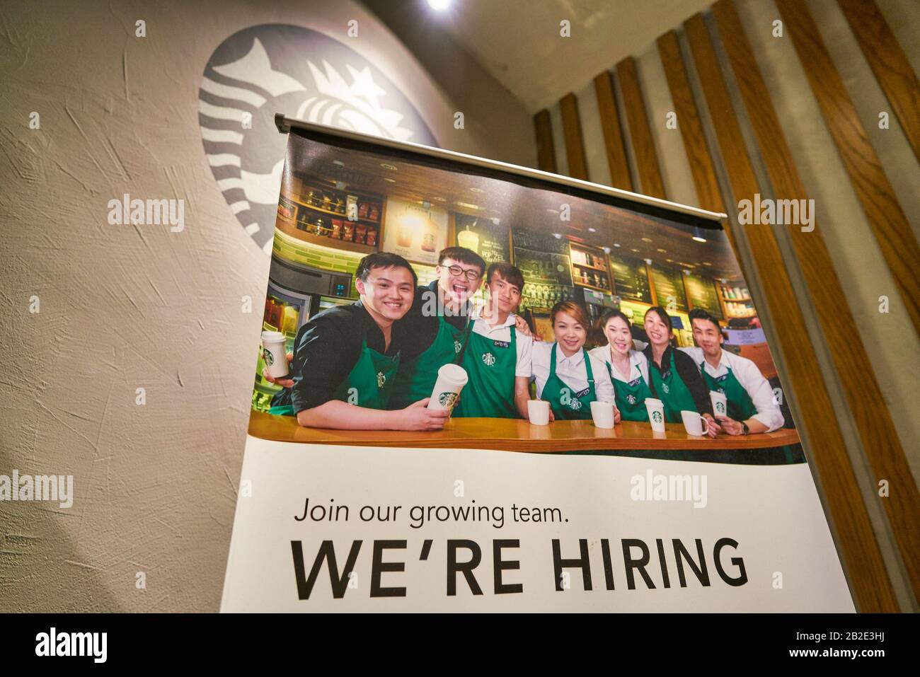 HONG KONG, CHINA - CIRCA JANUARY, 2019: hiring poster seen at Starbucks Coffee in Hong Kong. Stock Photo