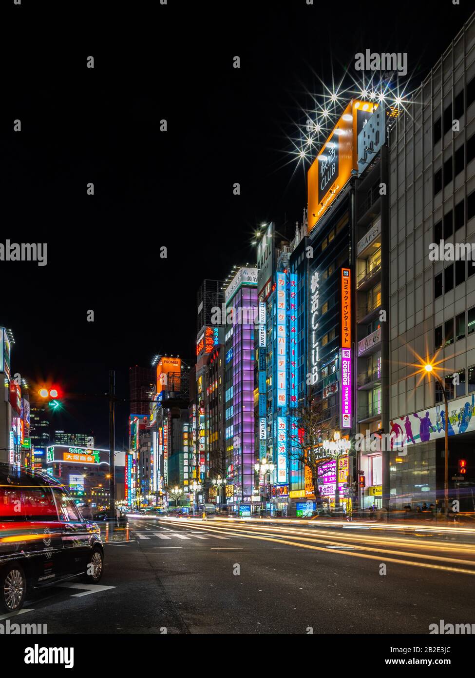 A picture of the Yasukuni-dori Ave, in Shinjuku City (Tokyo), at night. Stock Photo