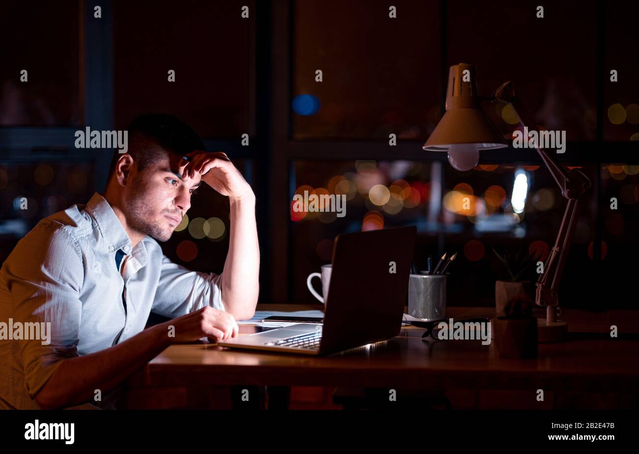 Hardworking Businessman At Laptop Working On Business Project In Office Stock Photo