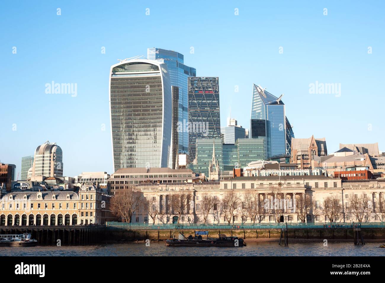 Custom House in the foreground overlooked by the skyscrapers of the City of London Stock Photo