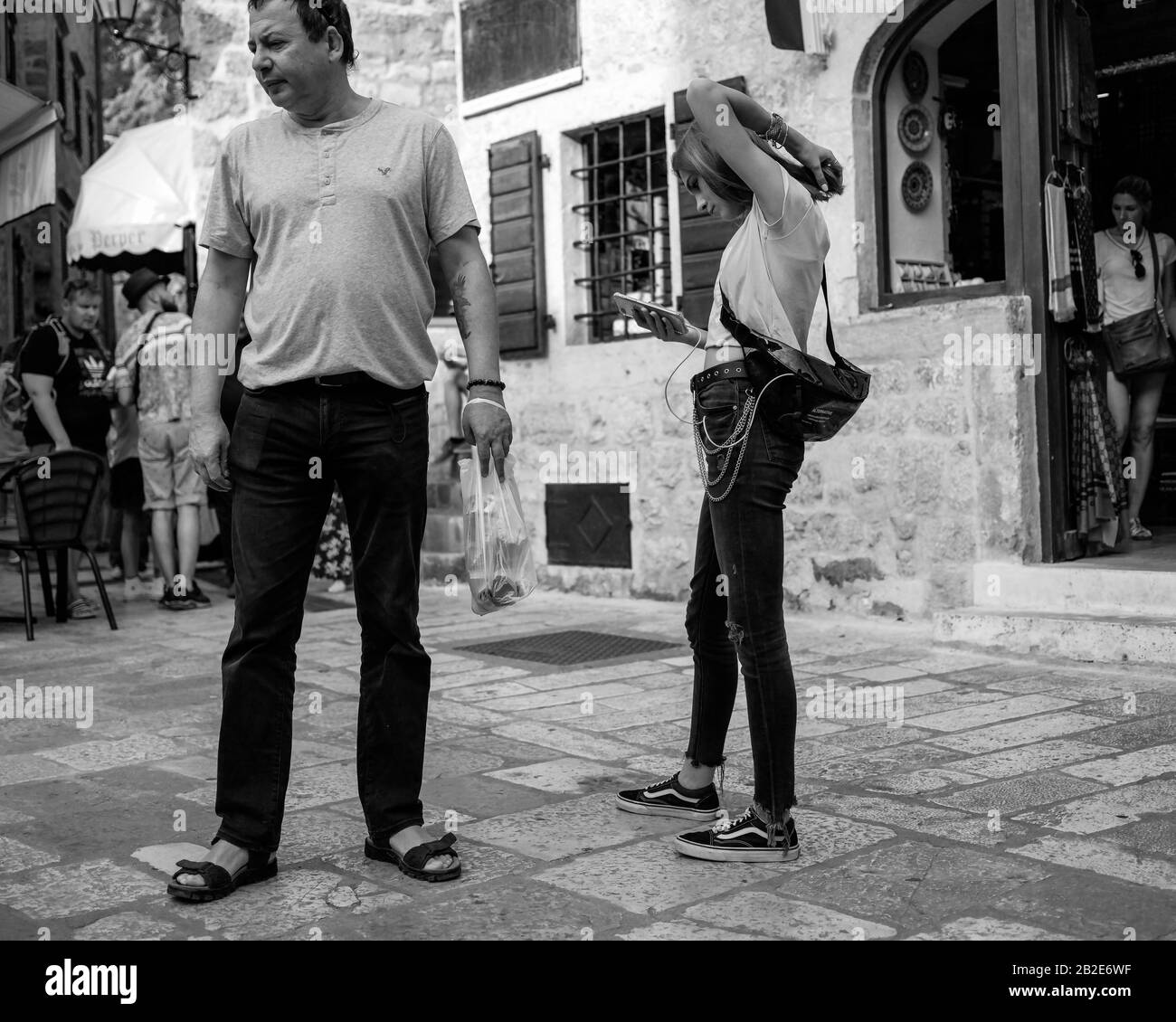 Montenegro, Sep 22, 2019:  Tourists at one of the squares in Kotor Old Town Stock Photo
