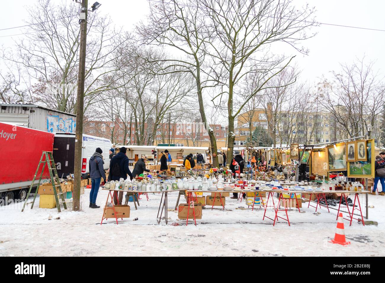 People shopping second hand vintage furnitures, clothes and stuffs show