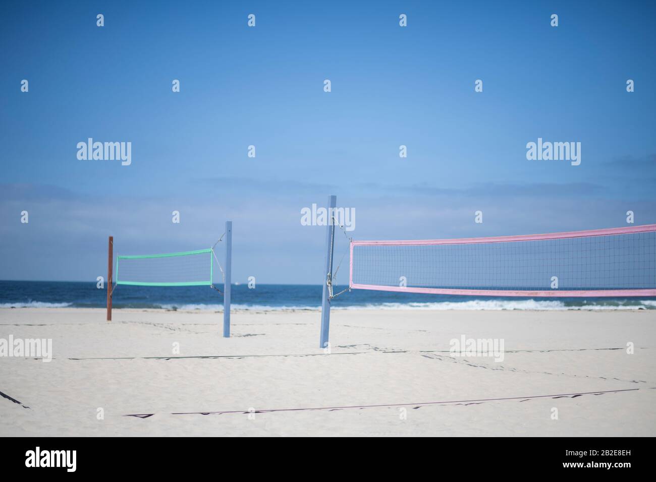 Beach volleyball courts on southern California beach Stock Photo Alamy