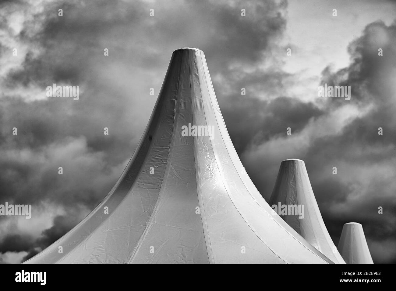 Three roofs of plastic canopies at an event Stock Photo