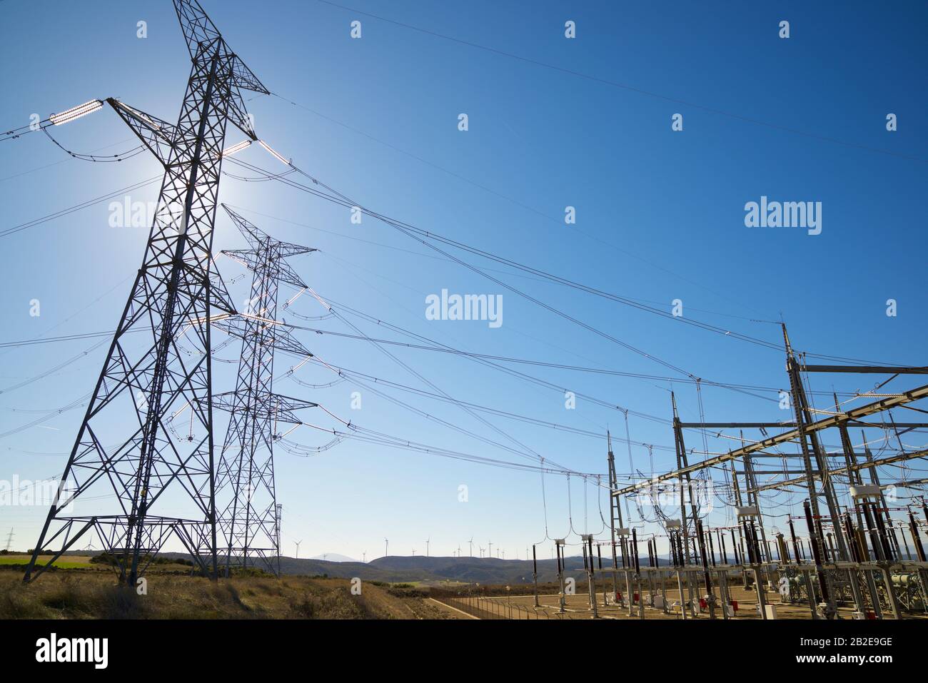 Power line and electrical substation Stock Photo Alamy