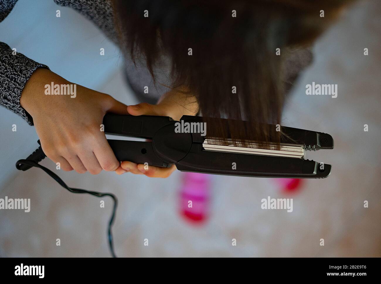 Ironing hair hires stock photography and images Alamy