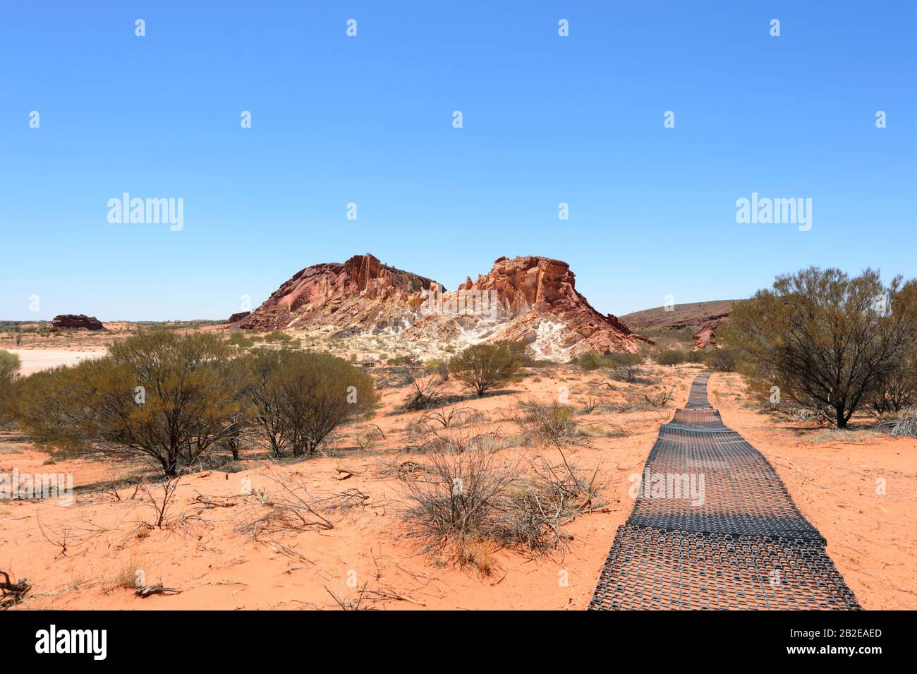 Walking trail protected from erosion by a plastic mat, Rainbow Valley Conservation Reserve, south of Alice Springs, Northern Territory, NT, Australia Stock Photo