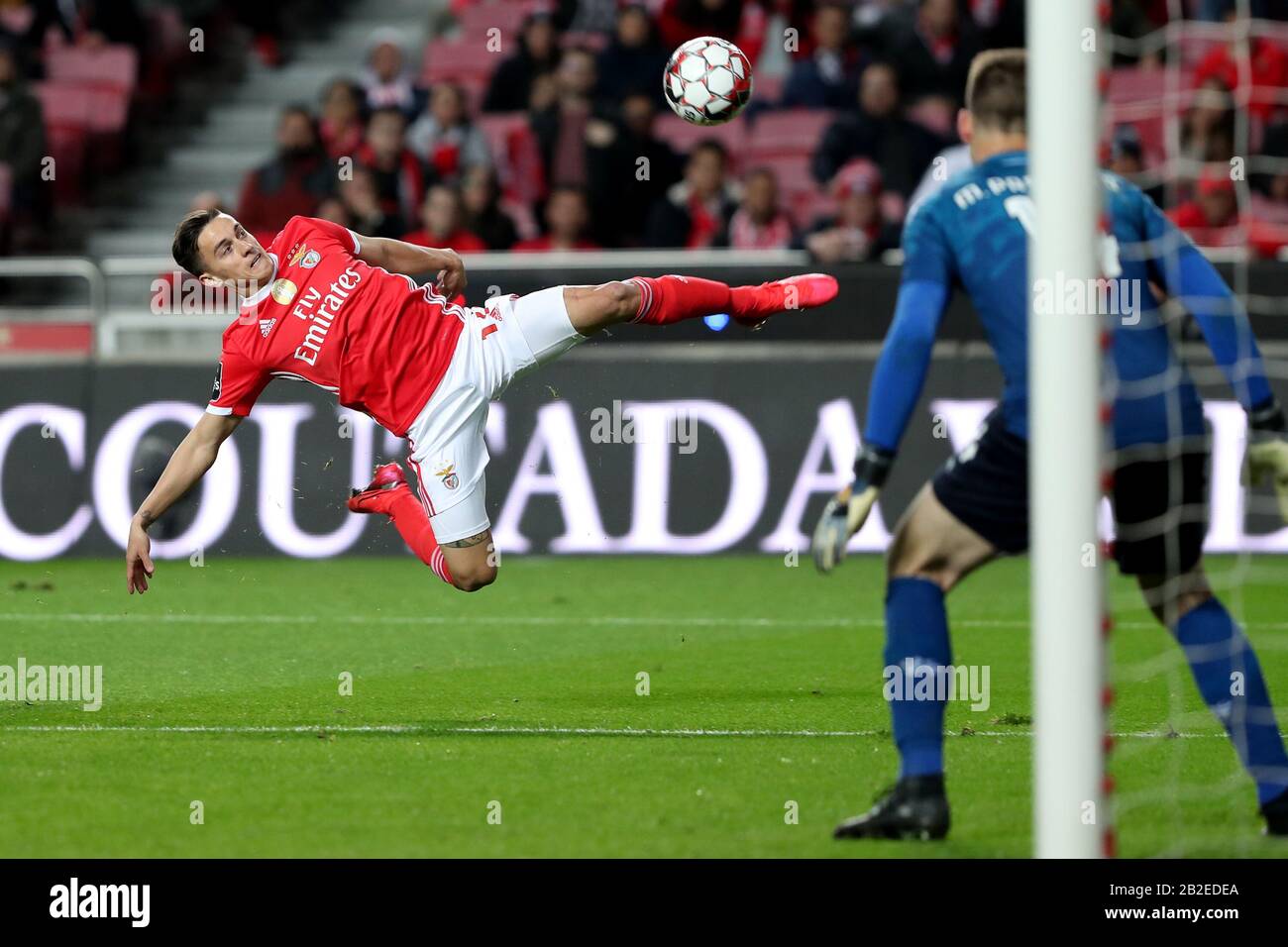 Lisbon, Portugal. 2nd Mar, 2020. Franco Cervi of SL Benfica (L) vies with Mateus Pasinato of Moreirense FC during the Primeira Liga football match between SL Benfica and Moreirense FC in Lisbon, Portugal, on March 2, 2020. Credit: Petro Fiuza/Xinhua/Alamy Live News Stock Photo