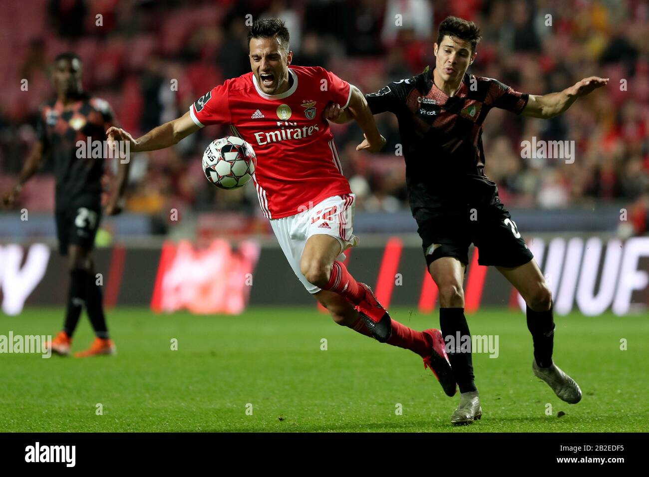 Lisbon, Portugal. 2nd Mar, 2020. Andreas Samaris of SL Benfica (L) vies with Filipe Soares of Moreirense FC during the Primeira Liga football match between SL Benfica and Moreirense FC in Lisbon, Portugal, on March 2, 2020. Credit: Petro Fiuza/Xinhua/Alamy Live News Stock Photo