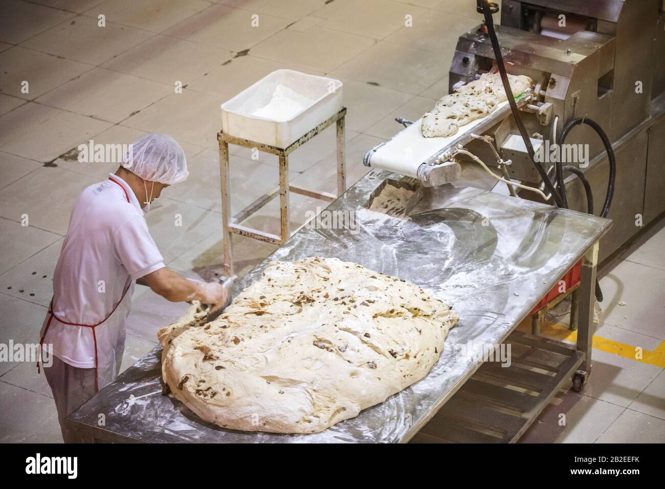 BEIJING, СHINA JUNE 01, 2019 Industrial production of bread baking