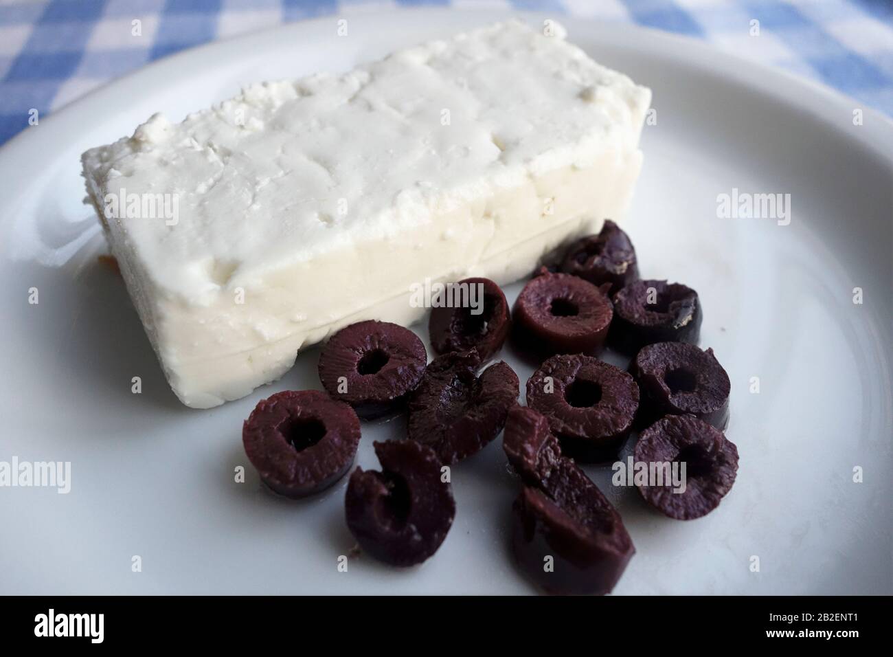 Greek Cuisine. Feta Cheese and Olive Rings with no stones Stock Photo