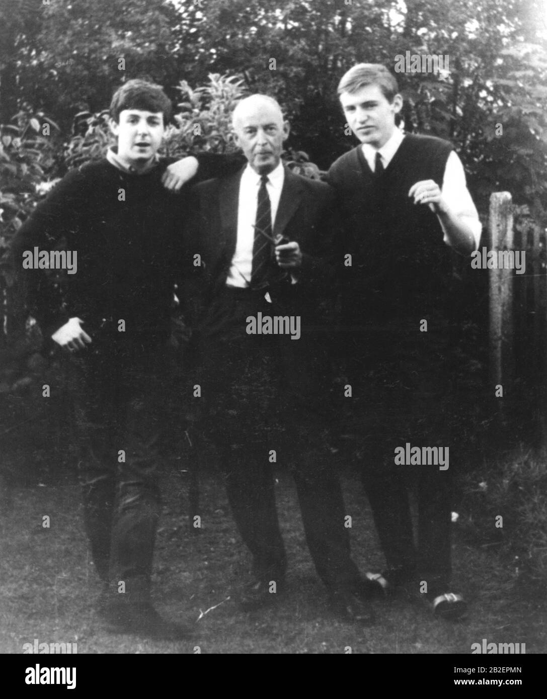 Circa 1960 - Liverpool, England, United Kingdom - The McCartney family from left, PAUL, the Beatles singer and songwriter, with his father JIM and brother MIKE in the garden of their home at 20 Forthlin Rd. (Credit Image: Keystone Press Agency/Keystone USA via ZUMAPRESS.com) Stock Photo