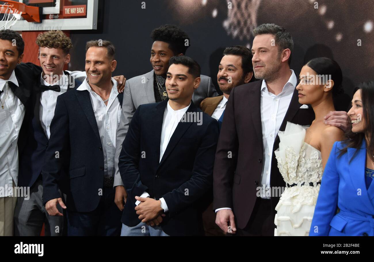 Los Angeles, California, USA 1st March 2020 (L-R) Actor Tyler O'Malley, actor Chris Bruno, actor Melvin Gregg, actor Fernando Luis Vega, actor Al Madrigal, actor Ben Affleck, and actress Janina Gavankar attend Warner Bros. Pictures 'The Way Back' World Premiere on March 1, 2020 at Regal LA Live in Los Angeles, California, USA. Photo by Barry King/Alamy Stock Photo Stock Photo
