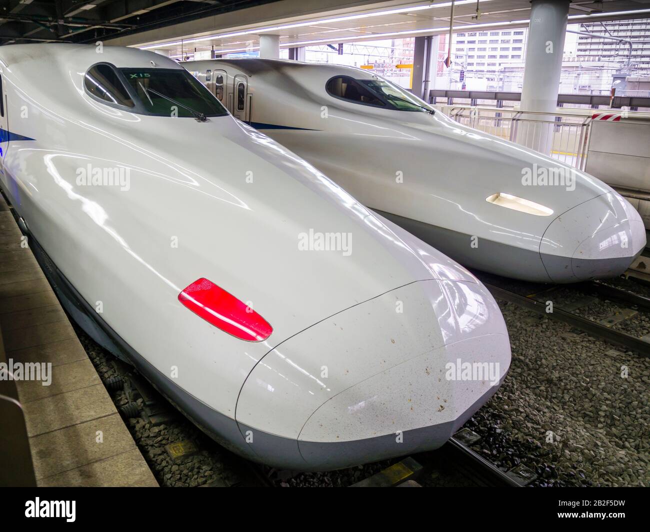 Tokyo, Japan - 13 Oct 2018: two N700 series Shinkansen bullet trains of the Tokaido line to Kyoto inside Tokyo train station. Stock Photo