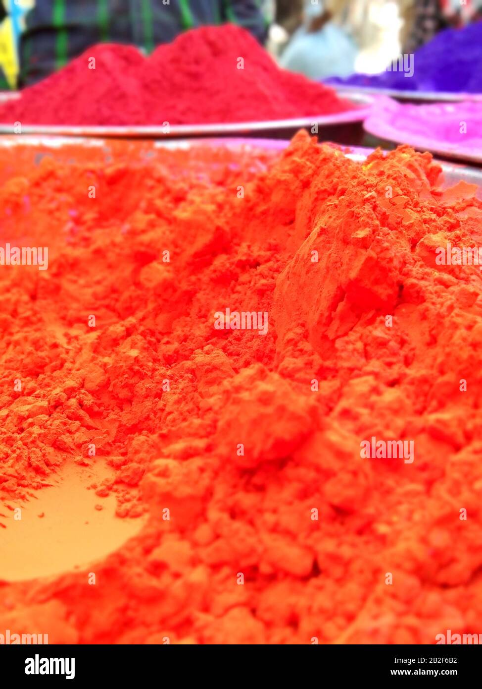 Colorful piles of powder sold on the market before Holi festival in ...