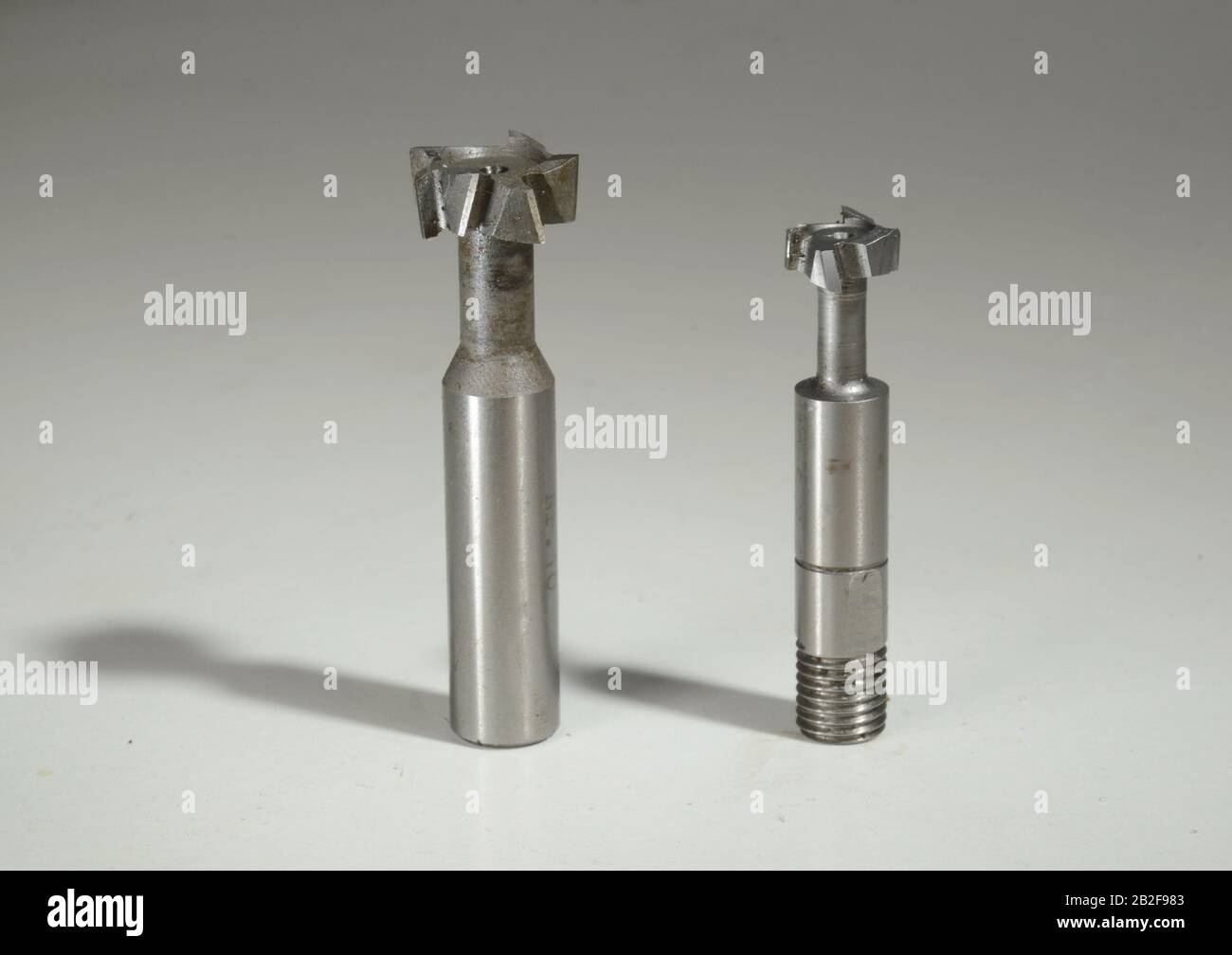 Two different milling tools for the making of T-grooves Stock Photo