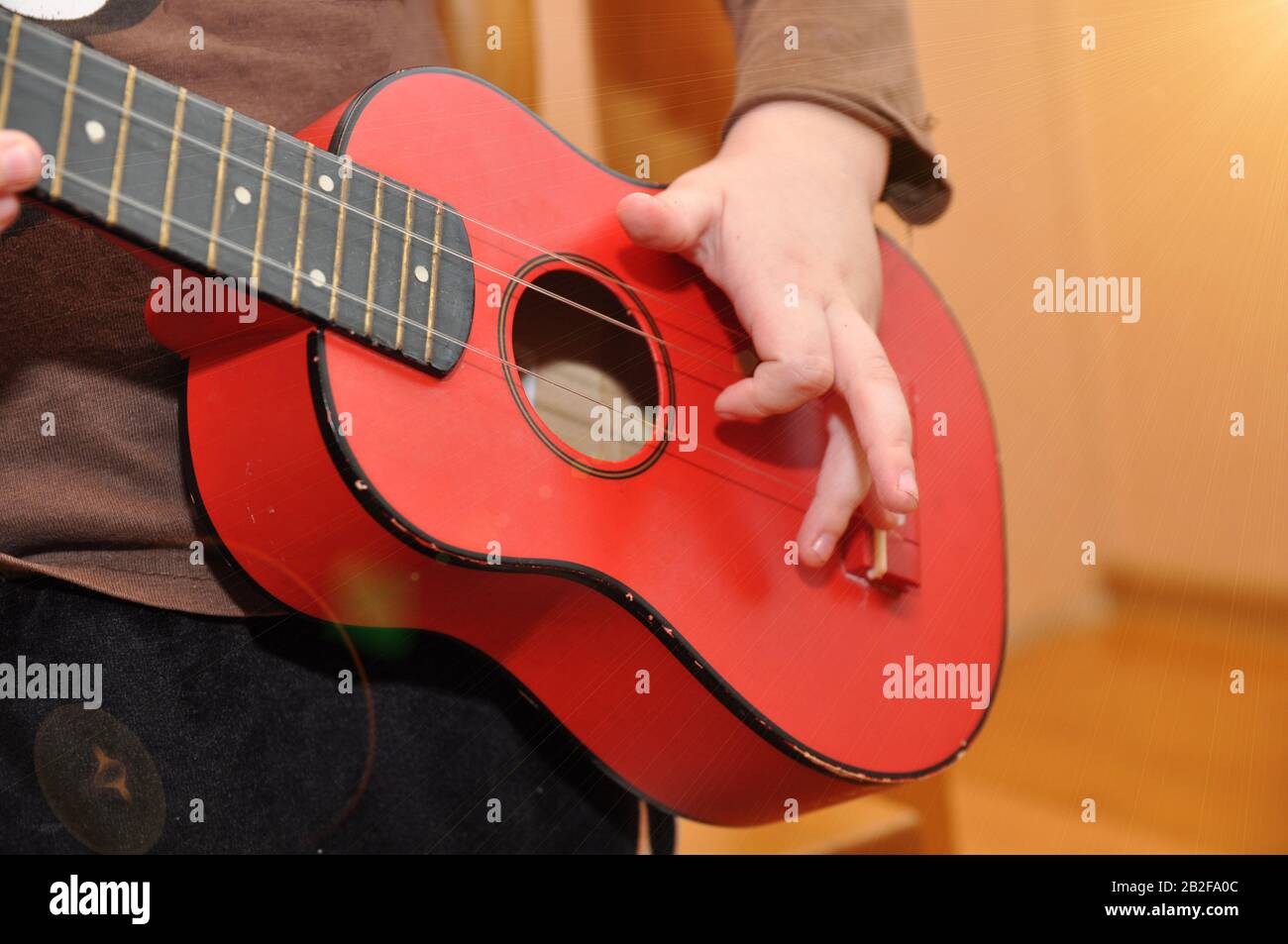 Childish instrument hi-res stock photography and images - Alamy