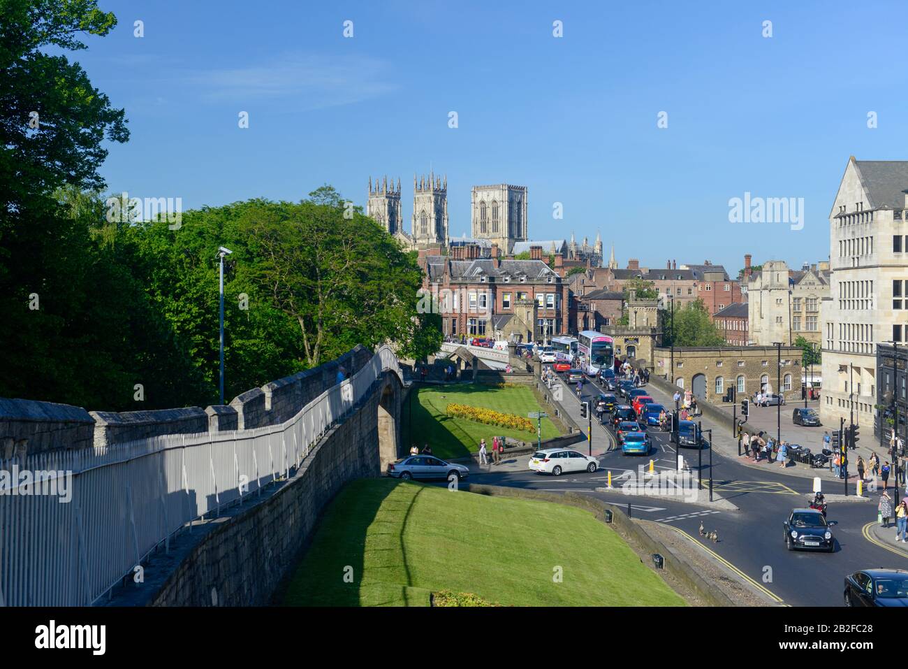 View along York city walls towards Lendal Bridge and York Minster Stock Photo