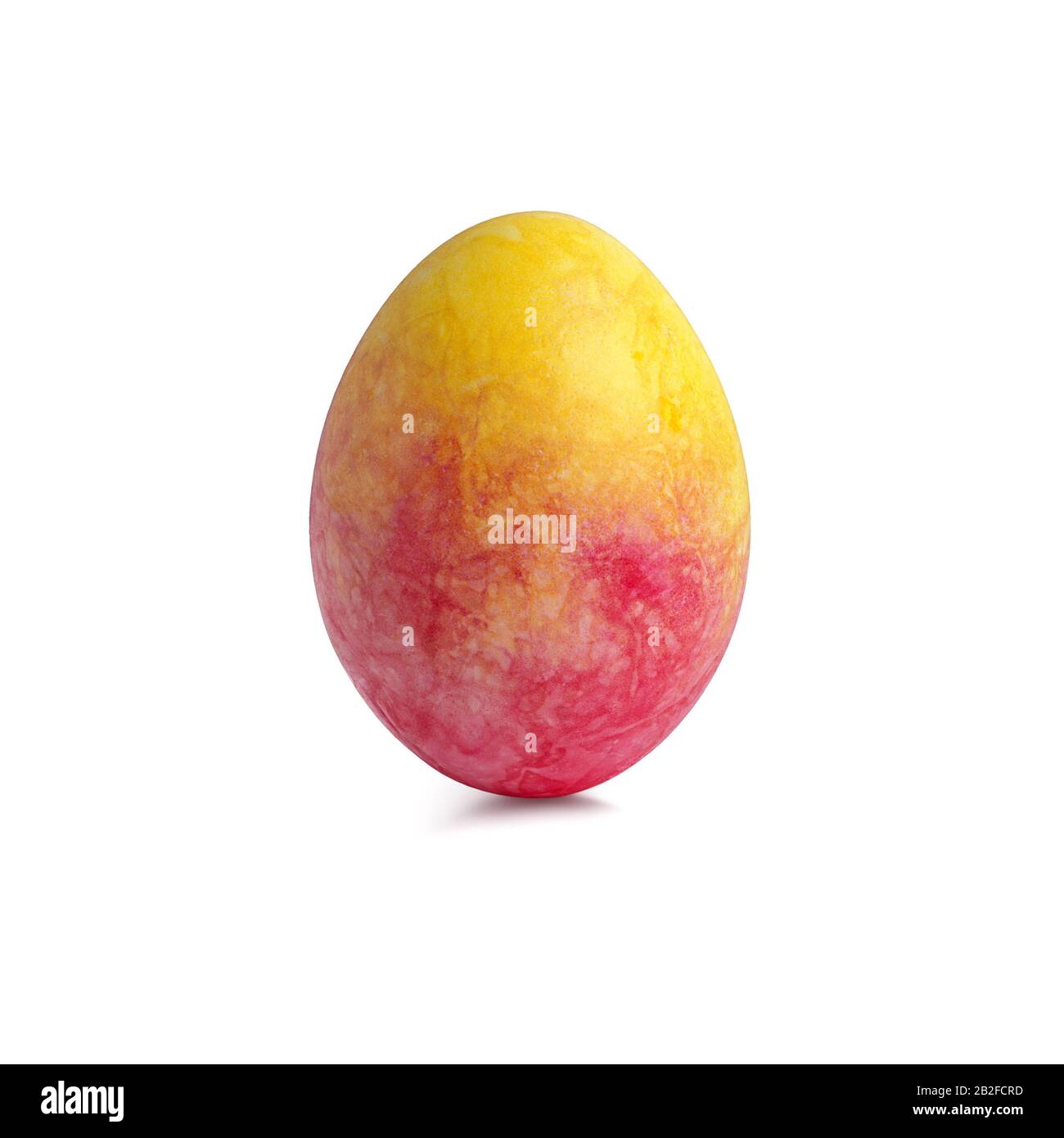 Single vertical easter egg with creative abstract red yellow pattern isolated on a white background Stock Photo