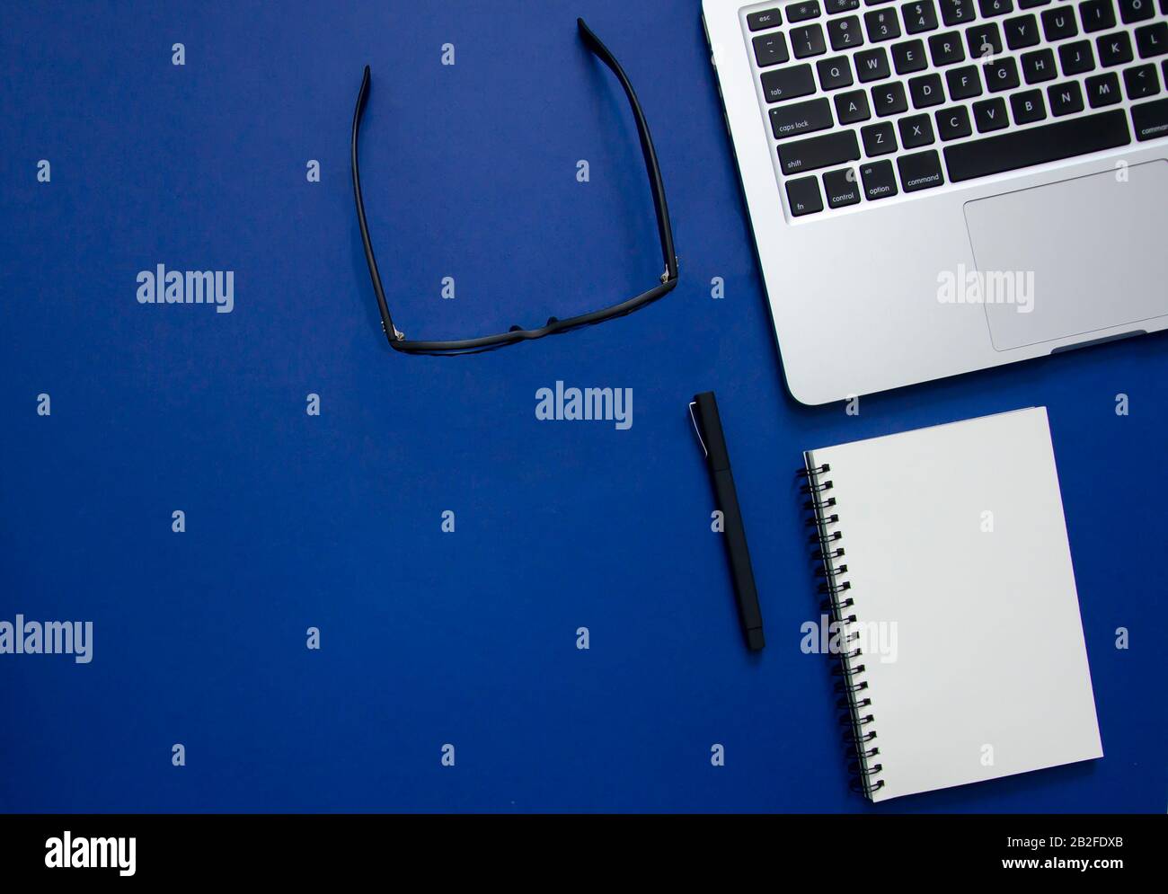 Flat lay stationery with blue background Stock Photo