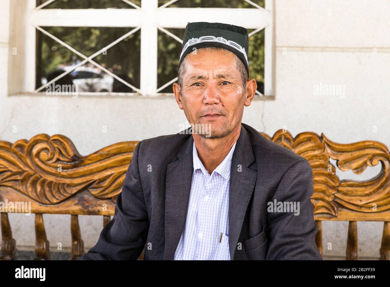 Local man at restaurant, M39 road, Qashqadaryo Region, Uzbekistan, Central Asia, Asia Stock Photo