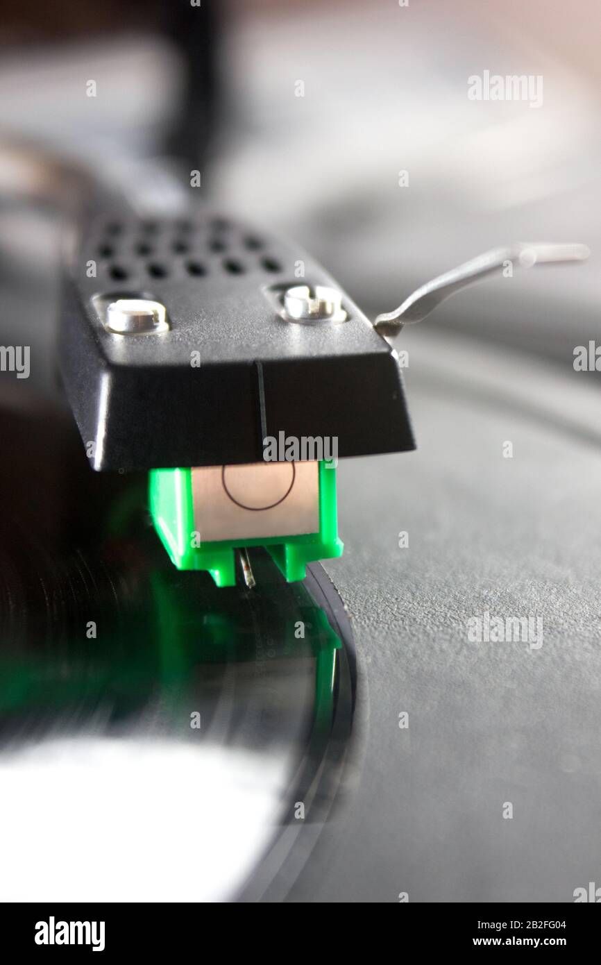 Turntable playing vinyl close up with needle on the record Stock Photo ...