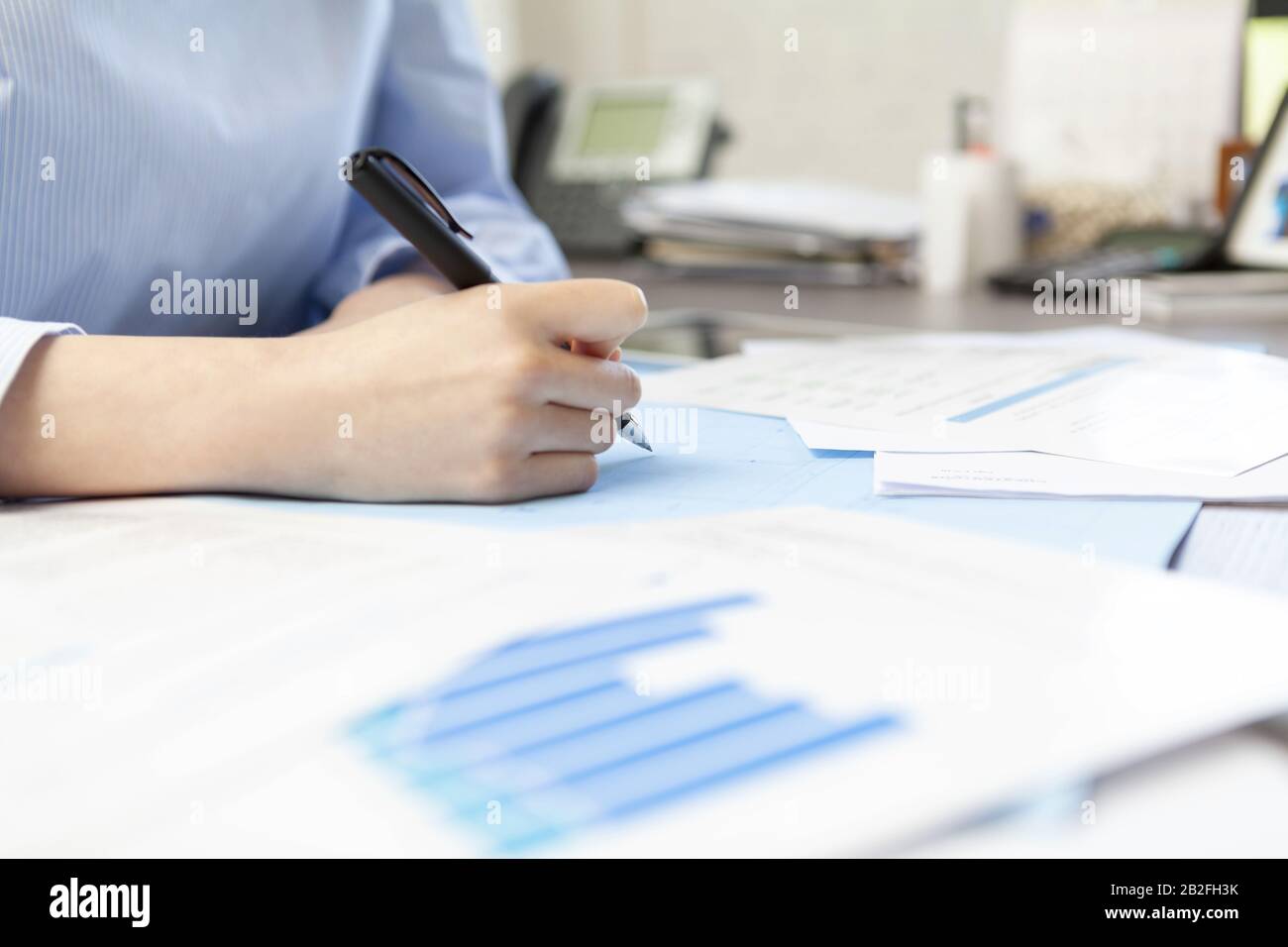 Architect drawing blueprints Beijing China Stock Photo