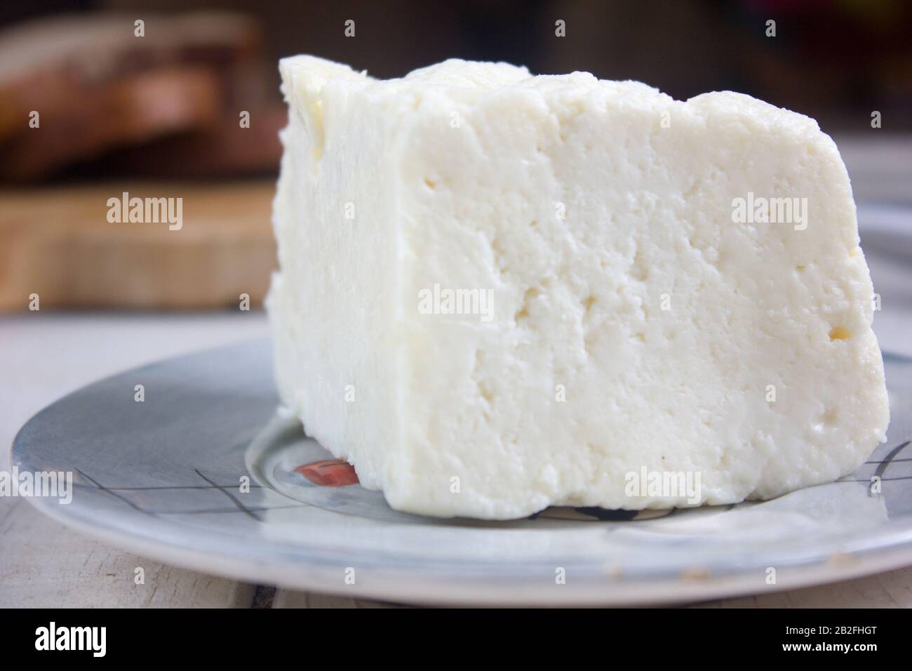 Traditional indian cheese panneer prepared form fresh milk on plate ...