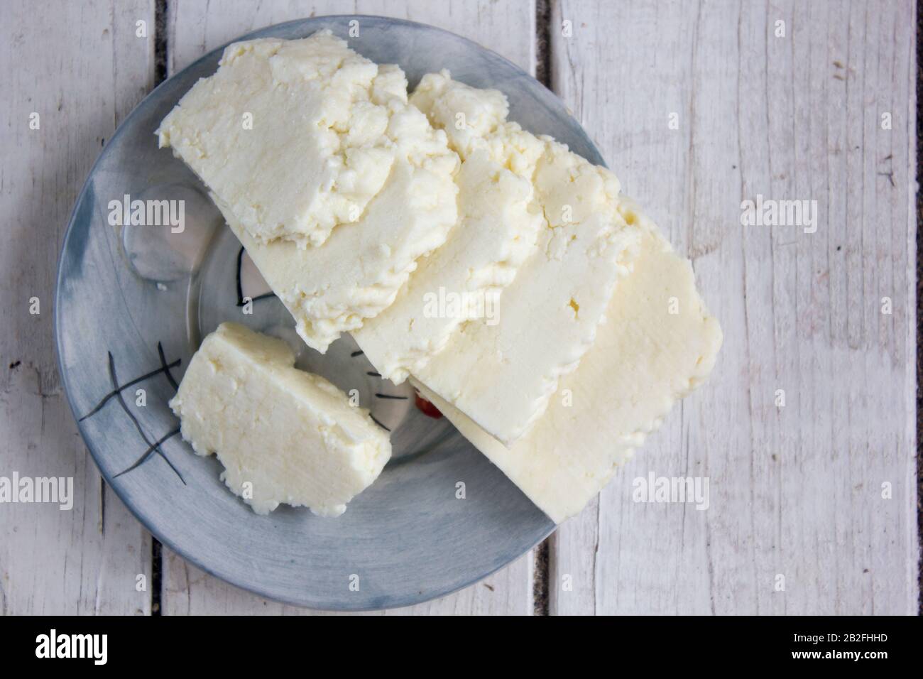 Traditional indian cheese panneer prepared form fresh milk on plate ...